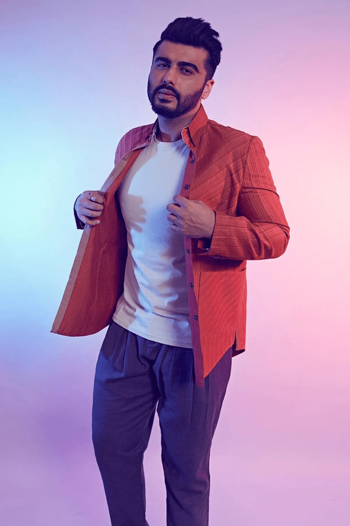 Arjun Kapoor In Rust trench style shirt jacket with flaps