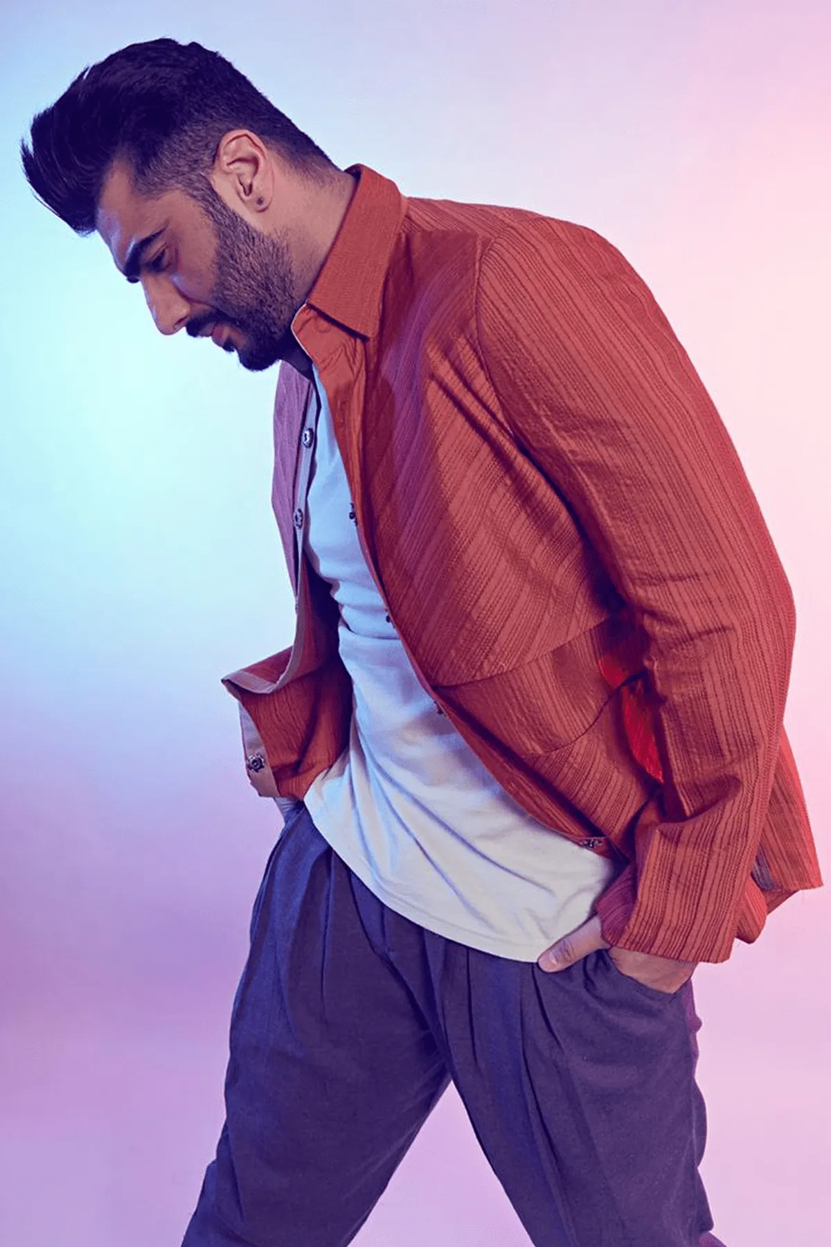 Arjun Kapoor In Rust trench style shirt jacket with flaps